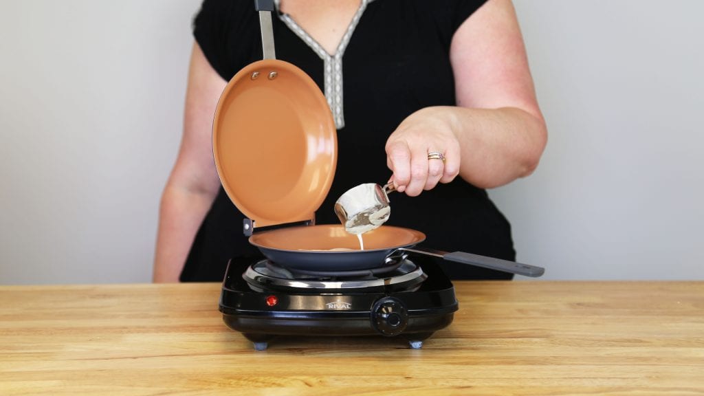 https://www.dontwasteyourmoney.com/wp-content/uploads/2019/08/pancake-maker-gotham-steel-bonanza-nonstick-copper-double-pan-action-reivew-forte-ub-1-1024x576.jpg