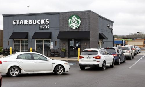 Cars line up at Starbucks drive-thru
