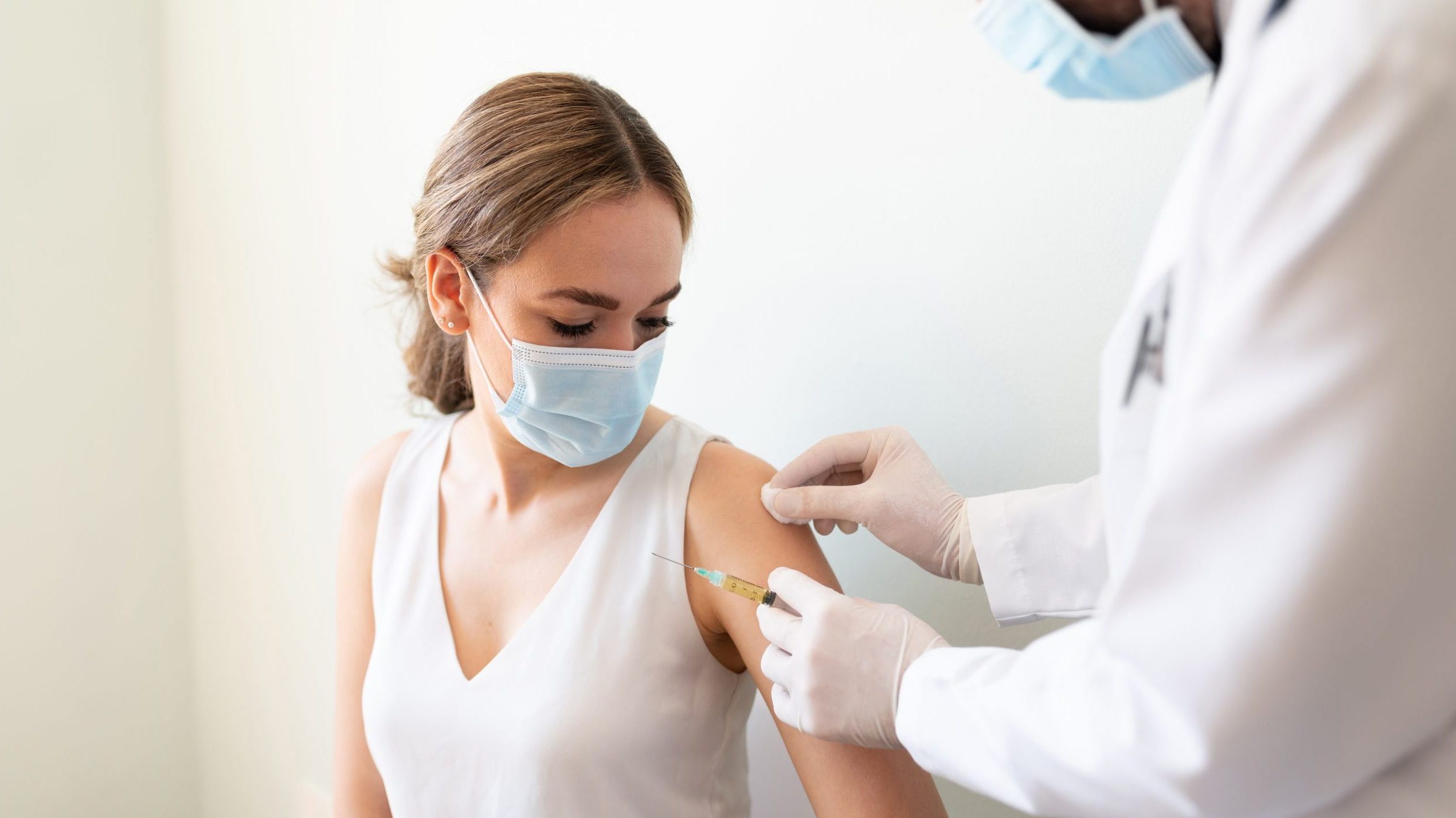 Patient receives vaccination in arm