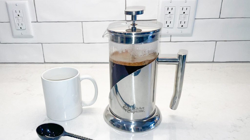 https://www.dontwasteyourmoney.com/wp-content/uploads/2021/02/french-press-kitchen-supreme-encapsulated-lid-stainless-steel-french-press-pour-review-ub-2.jpg