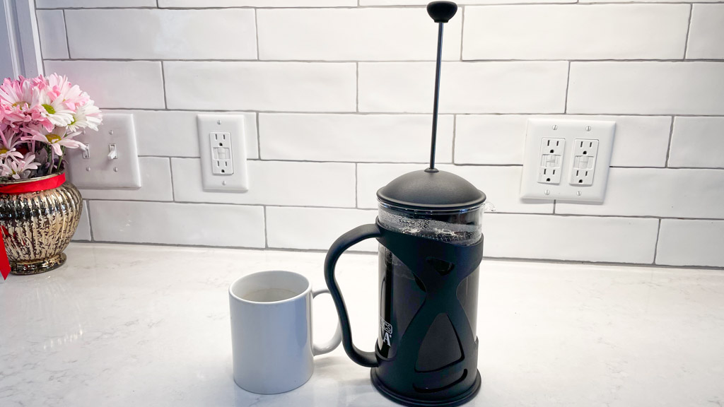 https://www.dontwasteyourmoney.com/wp-content/uploads/2021/02/french-press-kona-reusable-stainless-steel-filter-french-press-plunger-review-ub-1.jpg