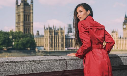 woman in red trench coat