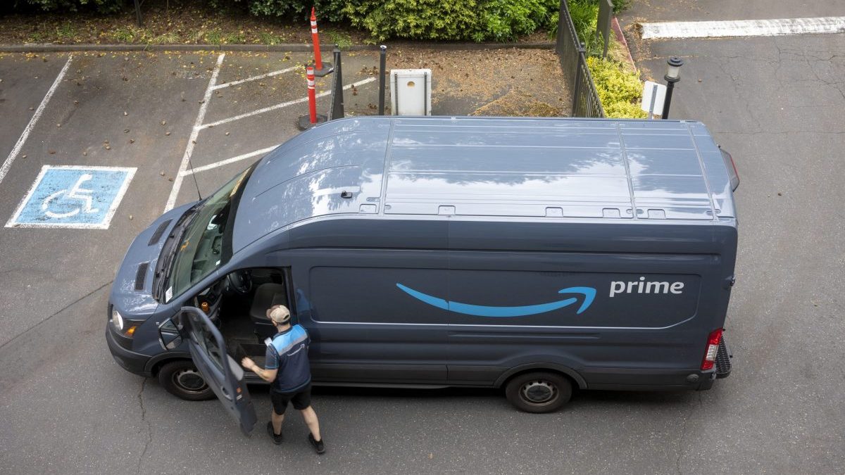 Amazon delivery driver getting into Amazon van