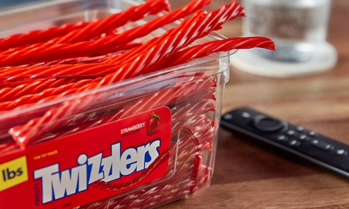 5-pound tub of Twizzlers open on table