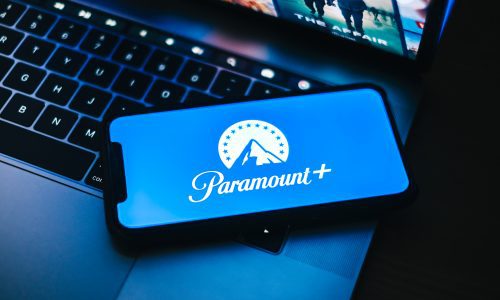 Paramount Plus logo on phone and laptop