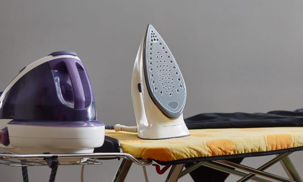 A garment steamer and iron are shown together.