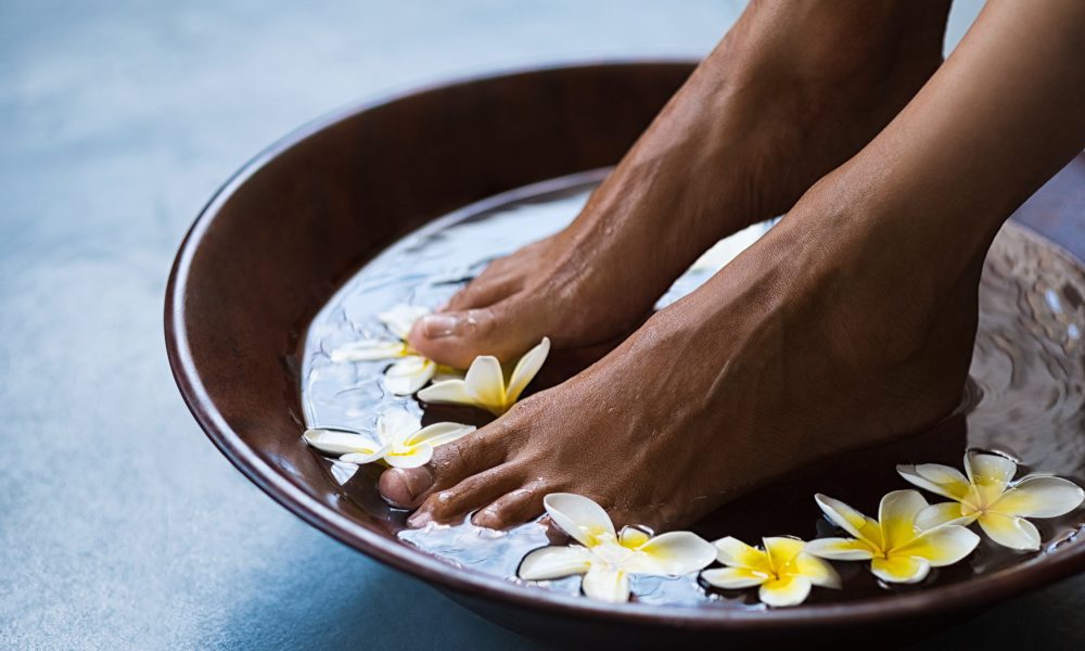 Feet in spa bowl for pedicure