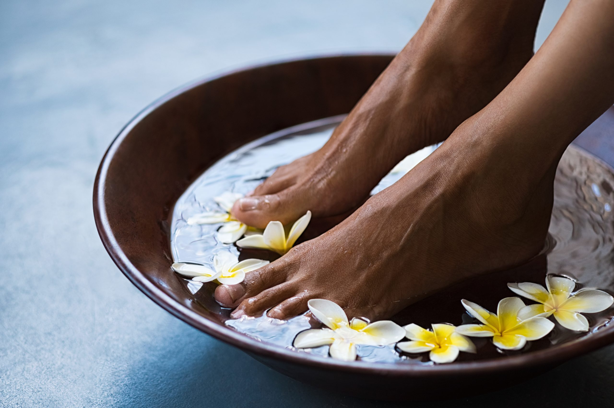 Feet in spa bowl for pedicure