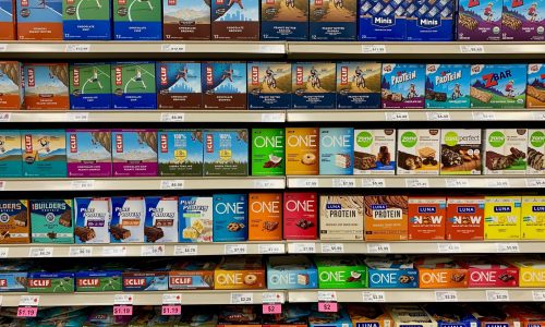 Rows of protein bars at grocery store