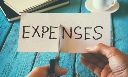 Cutting expenses sign