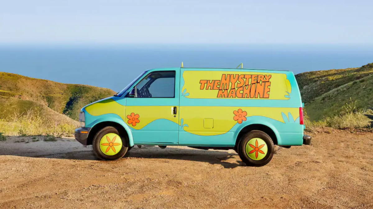Scooby-Doo's Mystery Machine van is shown on Airbnb.
