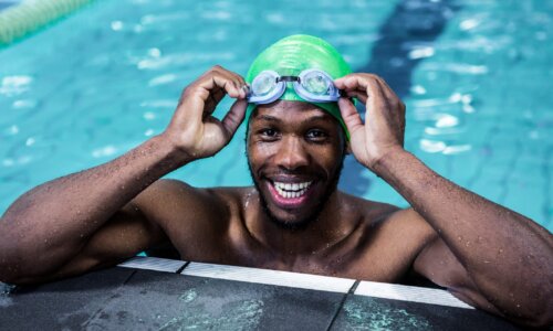swimmer with cap and googles in pool