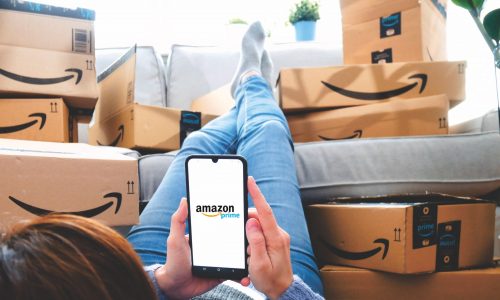 Amazon Prime packages stacked up in home