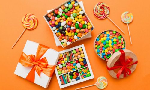 Gifts for a candy lover included assorted boxes of colorful treats.