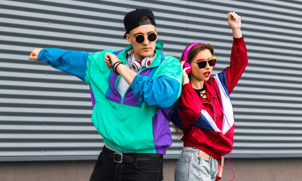 Man and woman in '90s fashions
