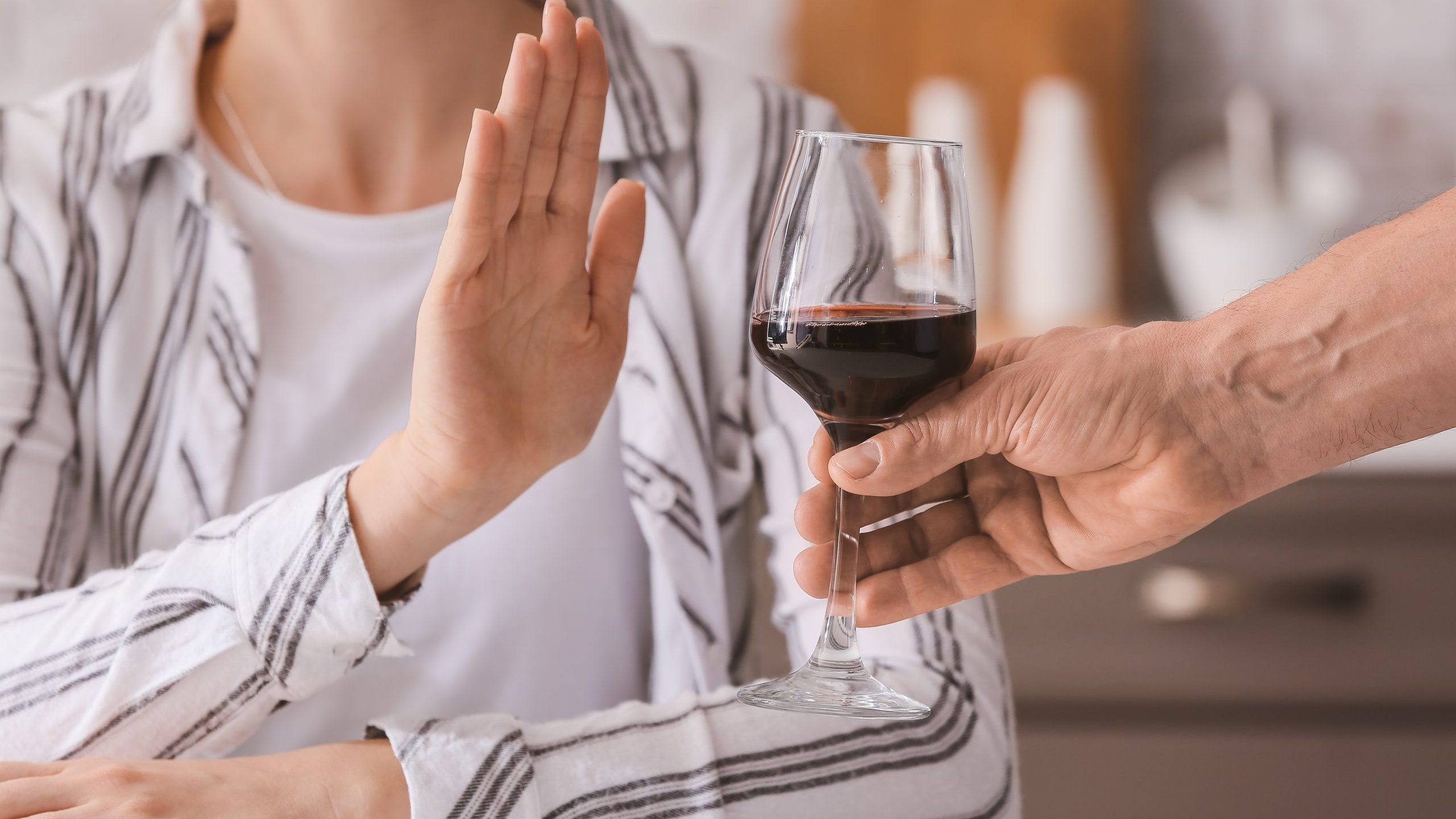 Woman refuses glass of wine for Dry January