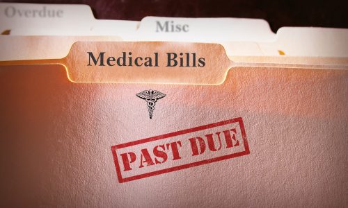 Past due medical bills on folder