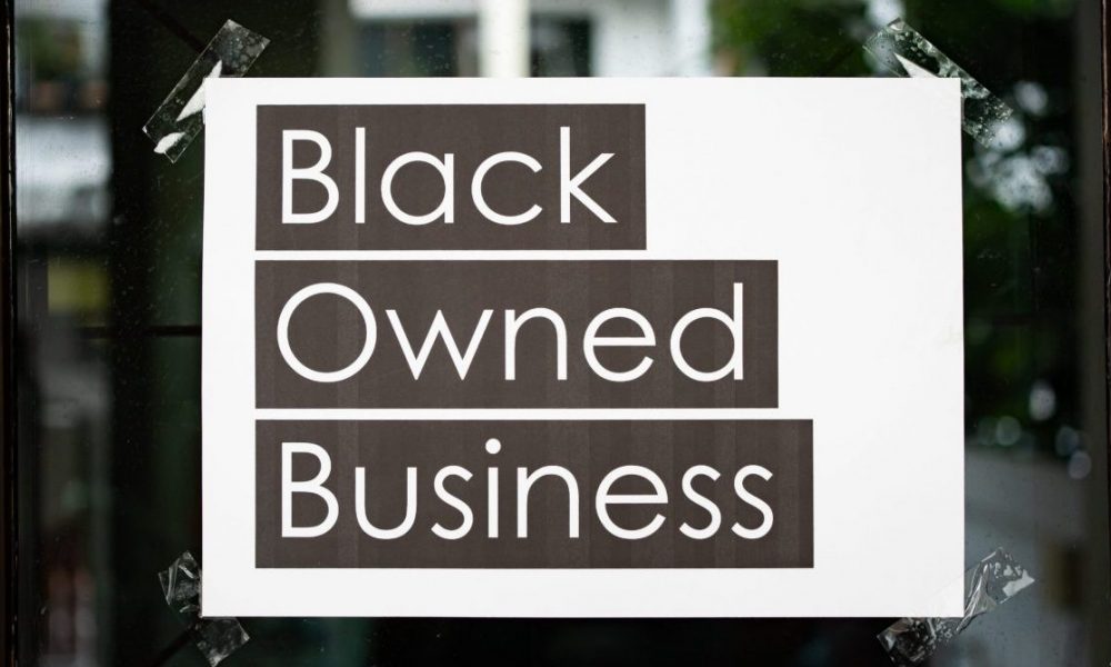 Black owned business sign