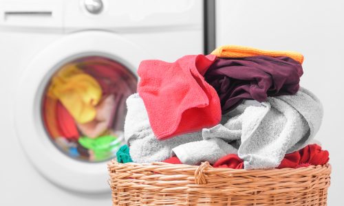 laundry in basket near dryer