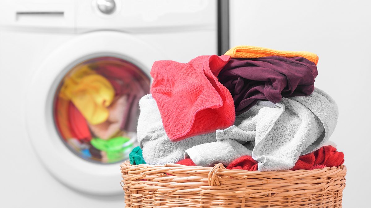 laundry in basket near dryer