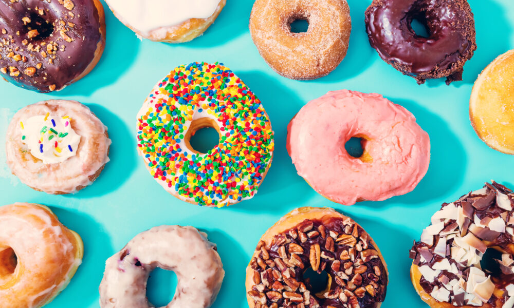 Assorted donuts on blue background