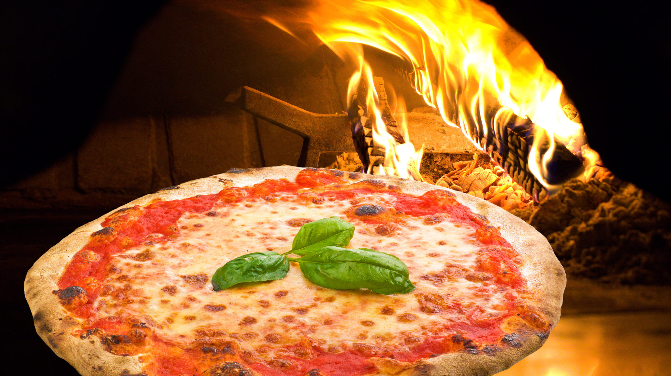 Pizza Margherita in a pizza oven