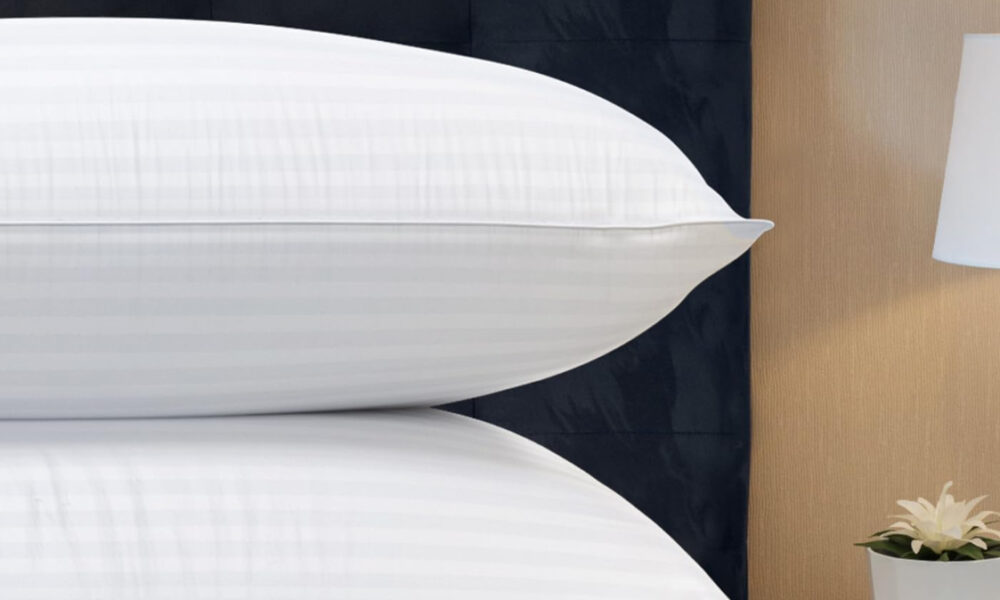Two queen-size cooling pillows on bed
