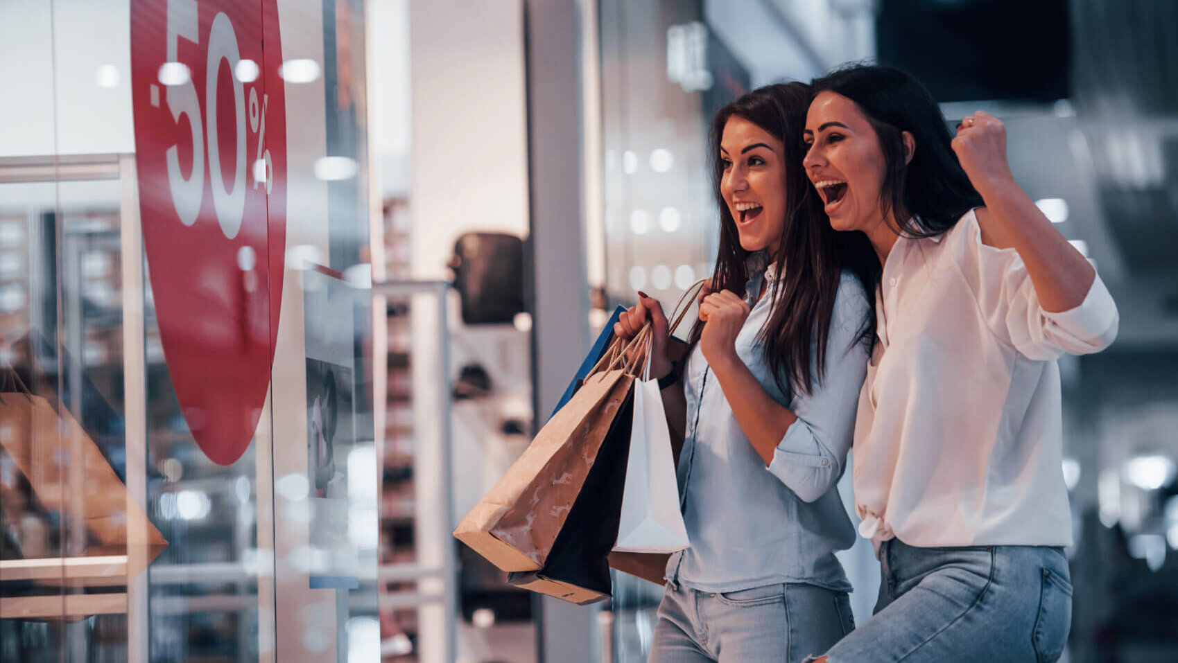 Two young women have a shopping day together