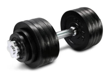 A Yes4All adjustable dumbbell with black cast iron plates on a chrome barbell