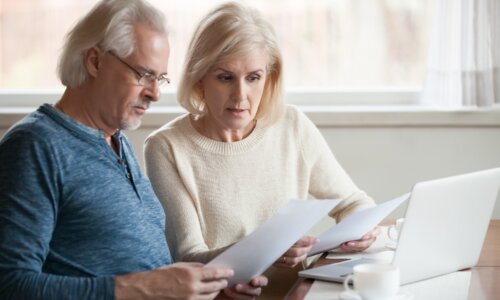 Older couple looks at finances for retirement
